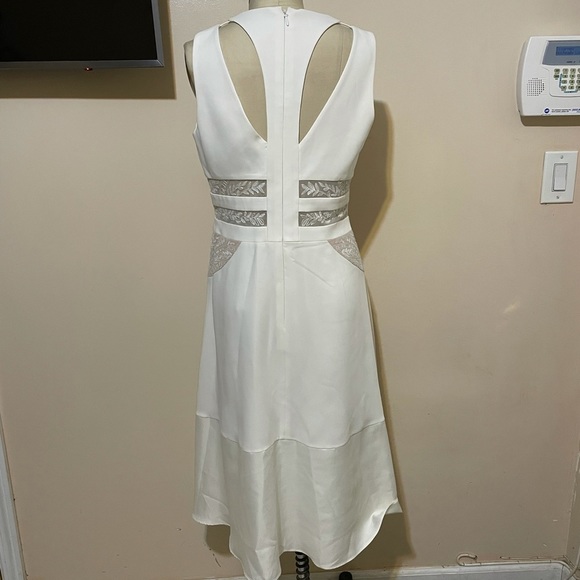 0063 NWT Karleigh Dress in Off White
BCBGMAXAZRIA sz 12 - Picture 6 of 14